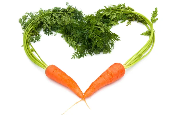 Fresh carrots shaped like a heart — Stock Image Fresh carrots shaped like a heart Stock Image