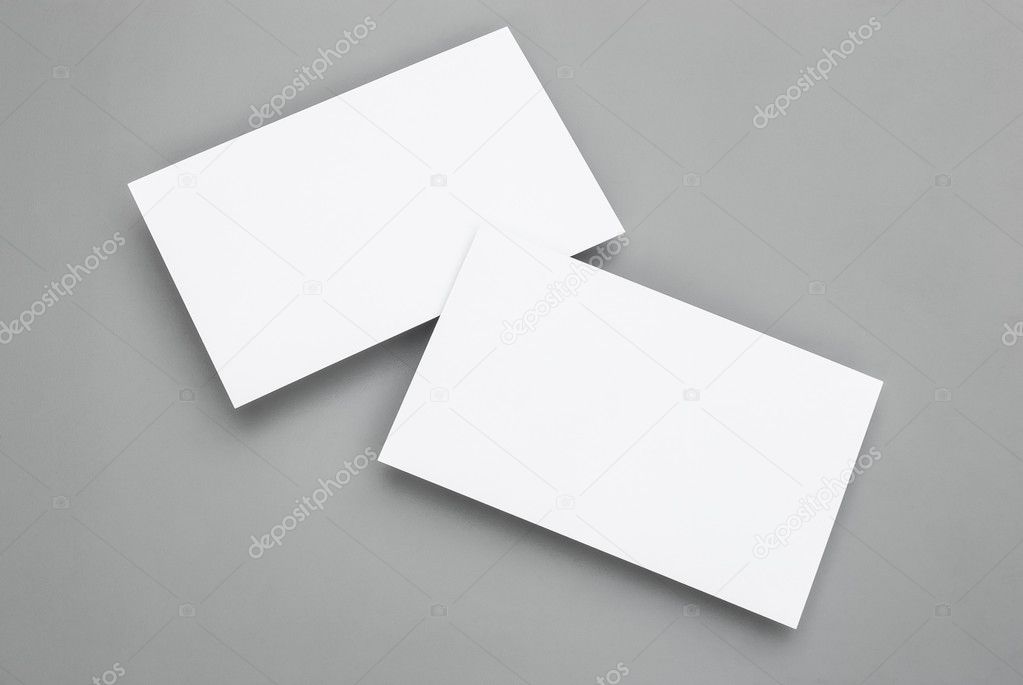 blank business cards on grey background