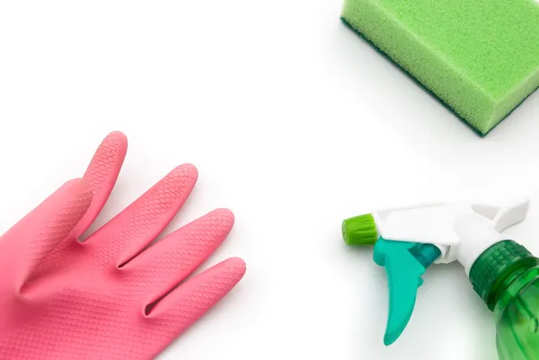 Sprinkling can and glove and cleaning sponge — Stock Photo, Image