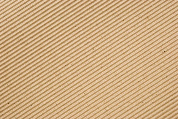 Cartón ondulado patrón de fondo, en ángulo — Foto de Stock
