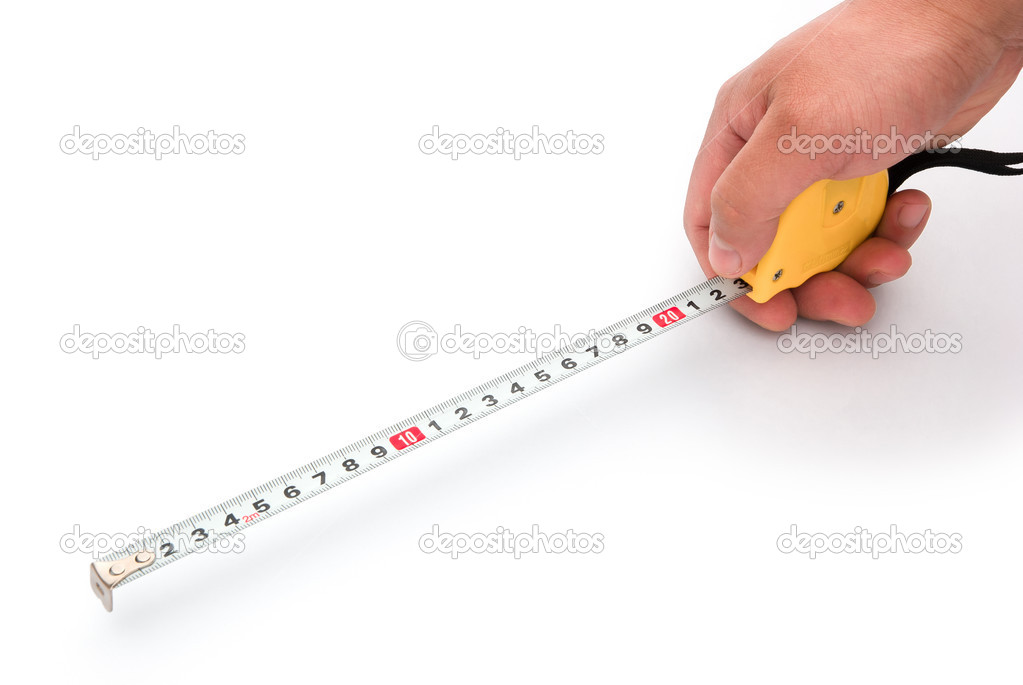 hand holding a tape measure with clipping path