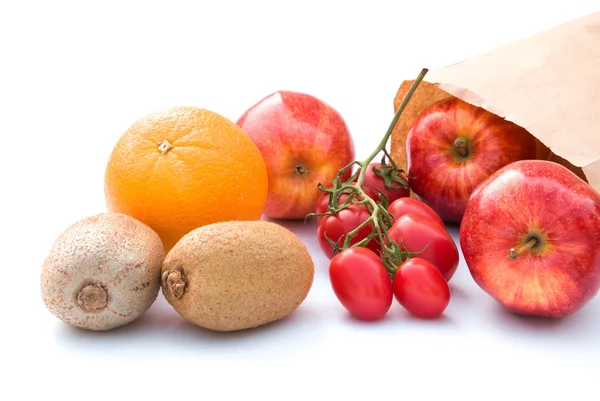 Saco de frutas e papel no fundo branco — Fotografia de Stock