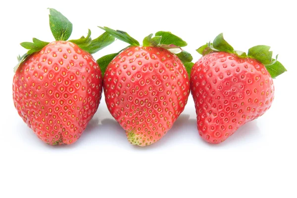 Tres piezas de fresas sobre fondo blanco — Foto de Stock