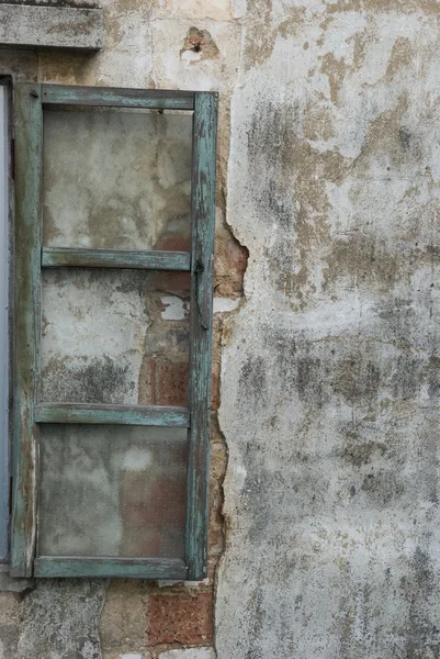 Old dirty window on old dirty wall Royalty Free Stock Photos