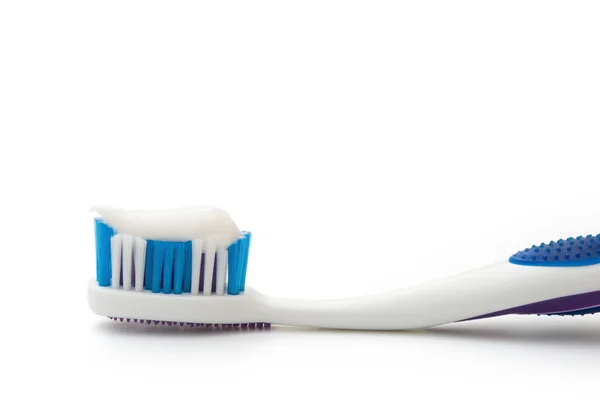 Toothbrush with toothpaste on white with clipping path — Stock Photo, Image