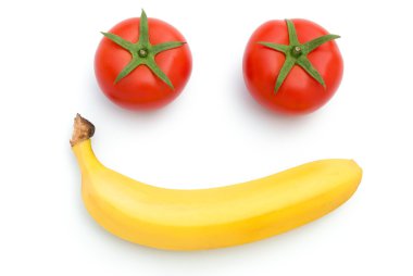 taze domates ve kırpma yolu yüzüyle gülümsüyor gibi havuç şekli