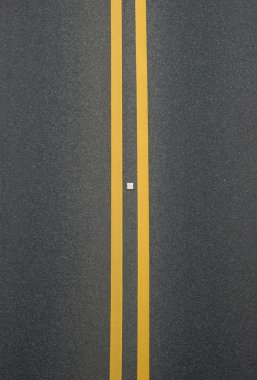 Double yellow lines divider on blacktop clipart