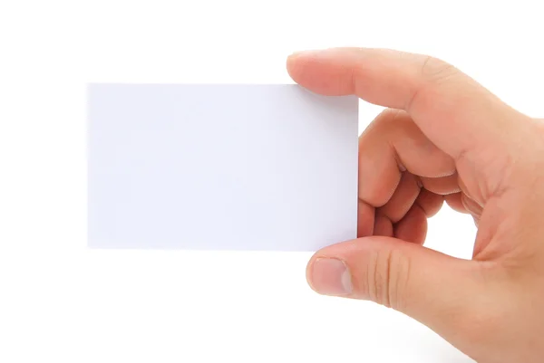 Mão segurando um cartão de visita em branco com caminho de recorte — Fotografia de Stock