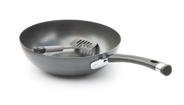 Saucepan and spatula on white — Stock Photo, Image