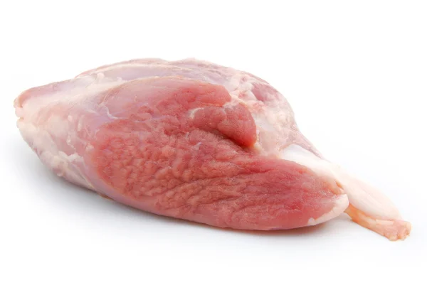 Carne fresca cruda sobre un fondo blanco — Foto de Stock