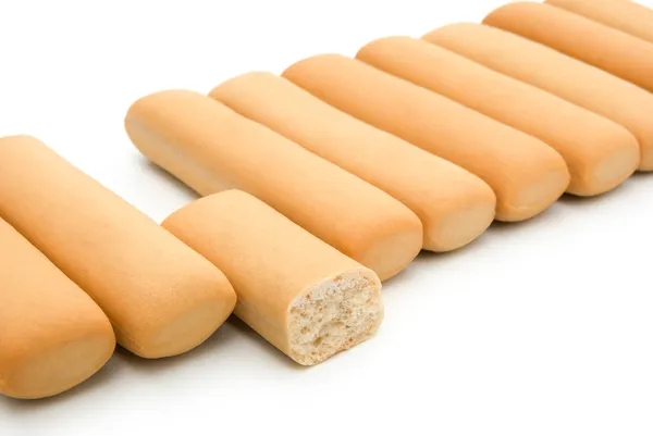 Biscuit sticks and a broken section with clipping path — Stock Photo, Image
