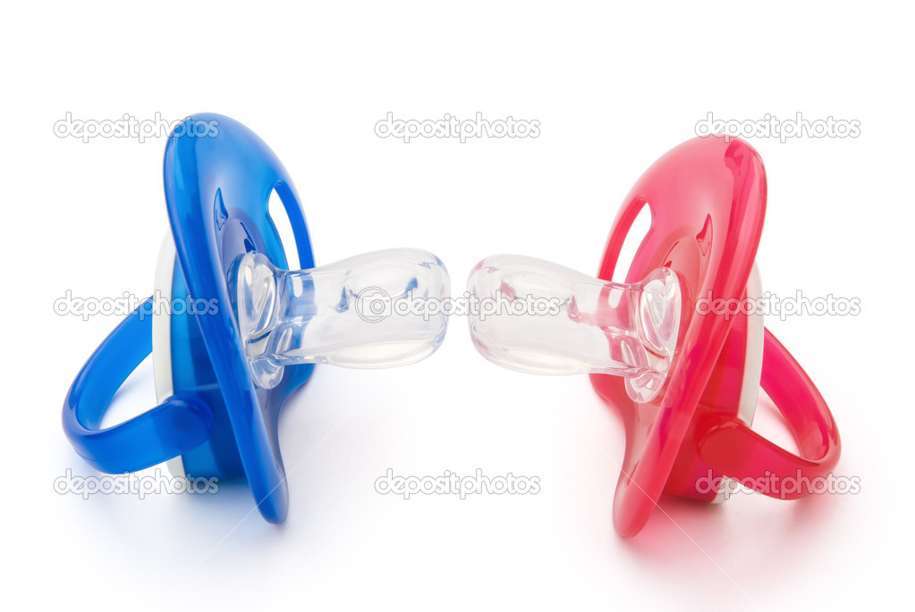Red and blue pacifiers isolated on white with clipping path