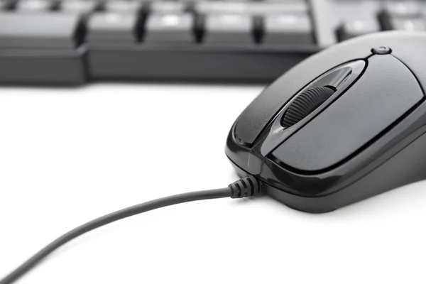 Black mouse and keyboard on white background — Stock Photo, Image