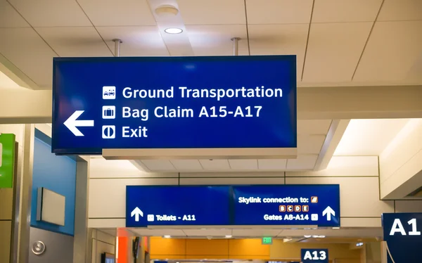 Arrival and departure gates signs — Stock Photo, Image