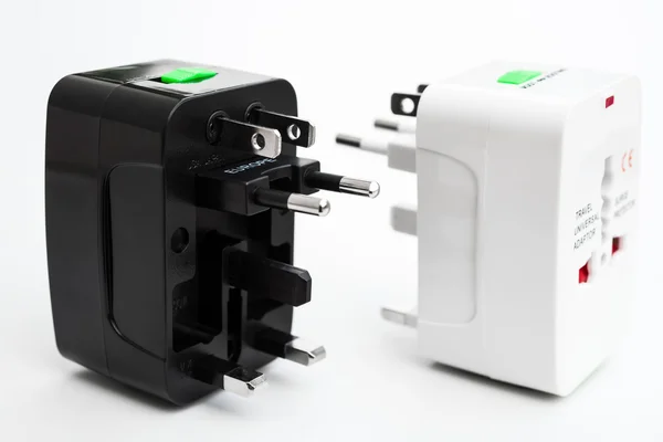 Black and white universal adapters — Stock Photo, Image