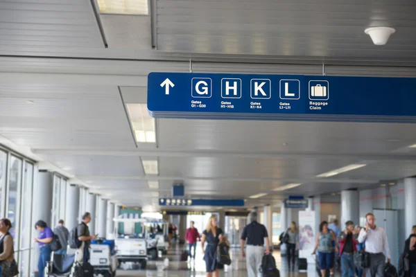 Departure gates signs in airport — Stock Photo, Image