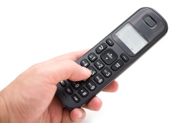 kırpma yolu ile bir kablosuz telefon çevirme adam