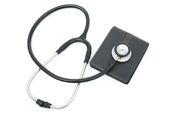 Bir cüzdan beyaz zemin üzerine yukarıda stetoskop — Stok fotoğraf