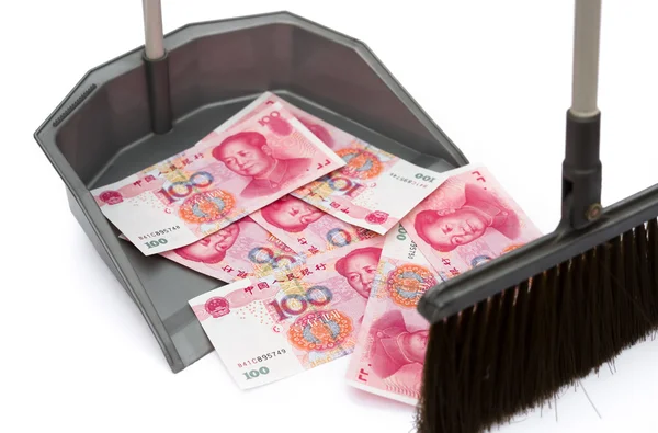 RMB in rubbish bin and a  besom, monetary concept — Stock Photo, Image