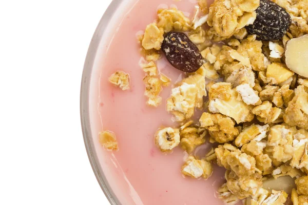 Top view wholegrain muesli on top of strawberry flavor yogurt with clipping path — Stock Photo, Image
