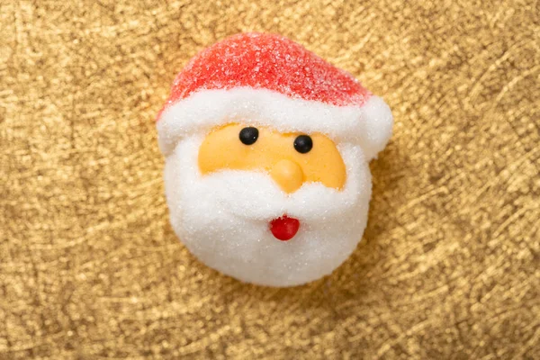 Santa Claus Cukroví Zlatém Pozadí — Stock fotografie