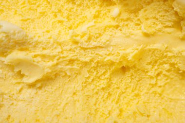 Üst görünüm ananas aromalı dondurma yatay kompozisyonda arka plan ve doku olarak kepçelenmişti