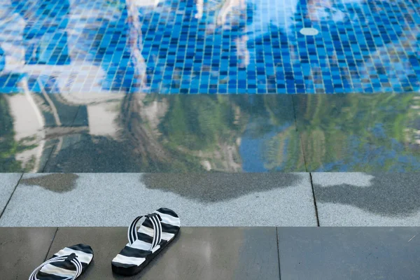 Angle View Swimming Pool Pair Slippers — Stockfoto