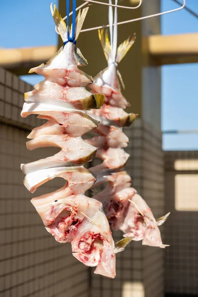 Raw Fishes Being Air Dried Balcony Vertical Compositon — Stock Photo, Image