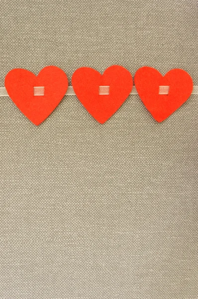 Tre hjärtan från filt — Stockfoto