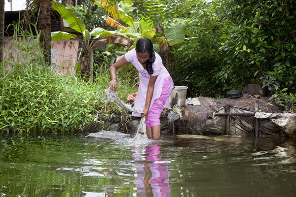 Woman washing clothes