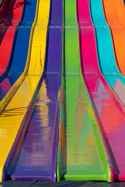Close Abstract View Large Giant Slide Fairgrounds Rainbow Colors — Stockfoto
