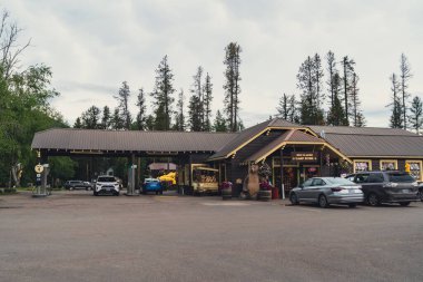West Glacier Village, Montana - July 3, 2022: Exterior of the West Glacier Camp Store, selling gas, food, supplies and gifts just outside of Glacier National Park