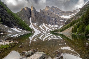 Lake Agnes in the Lake Louise area of Banff National Park, reached via hiking. Calm water in the morning