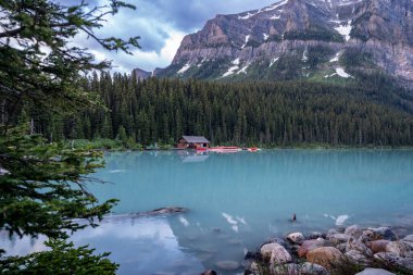 Boathouse at Lake Louise in Banff National Park at sunrise