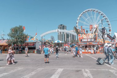 Calgary, Alberta, Canada - July 15, 2022: People enjoy the Calgary Stampede at the Stampede Park in summer