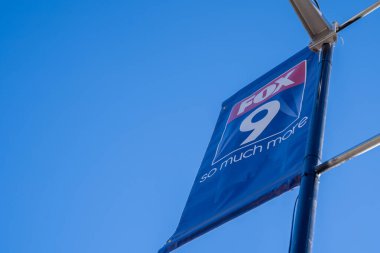 St. Paul, Minnesota - September 3, 2022: Fox 9 TV Station banner at the news broadcast booth at the Minnesota State Fair