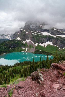 Teal Grinnell Lake along the Grinnell Glacier trail in Glacier National Park Montana
