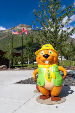 Waterton, Alberta, Canada - July 5, 2022: Parka, the beaver mascot for Parks Canada, statue outside the Visitors Centre