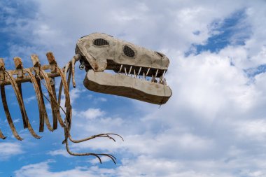 Glendive, Montana - July 22, 2022: Welcome to Glendive sign features a dinosaur skeleton, as the town is known for fossils