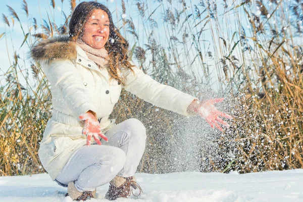 Woman playing with snow — Stock Photo, Image