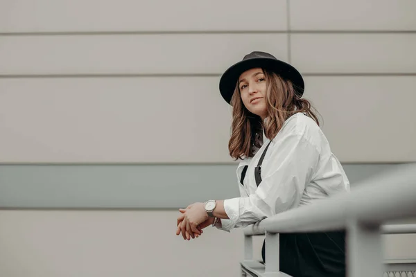Elegant Fashionable Woman Wearing White Shirt Black Hat Confident Girl Stock Image