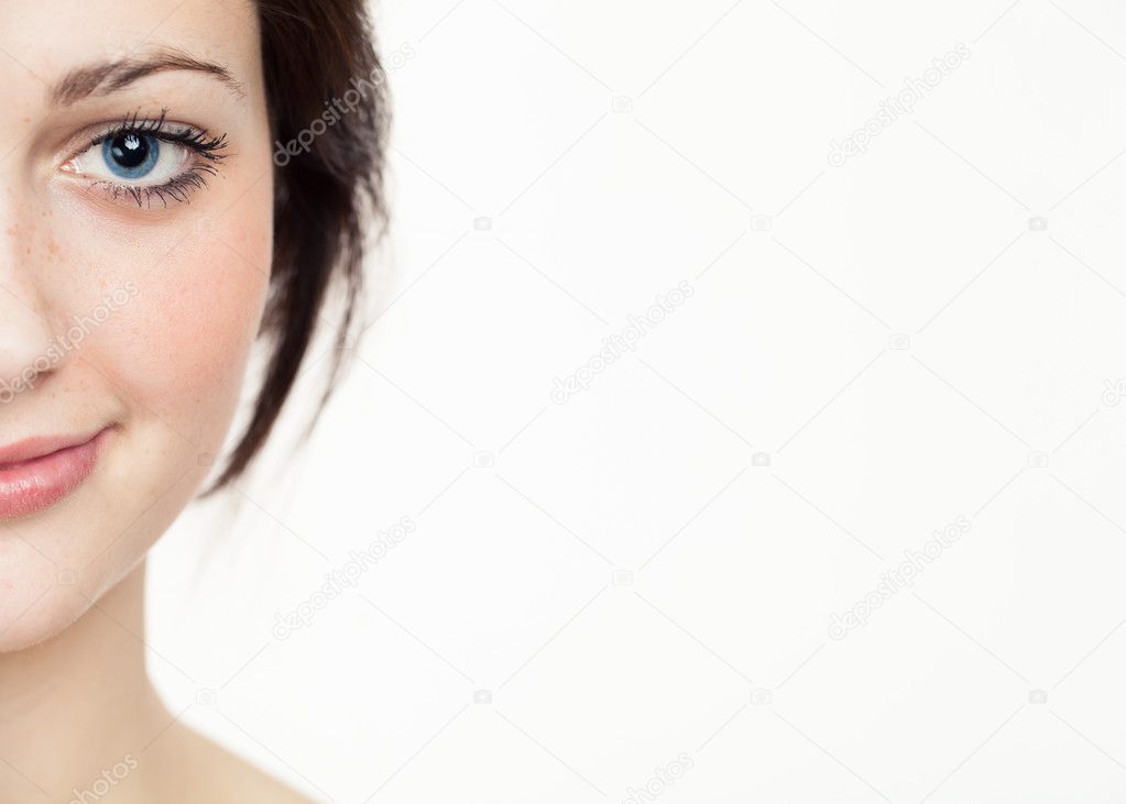 Half face portrait of beautiful young woman. Attractive Caucasian Woman