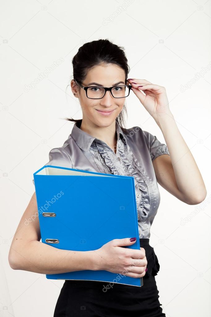 Young business girl with documents. Business woman