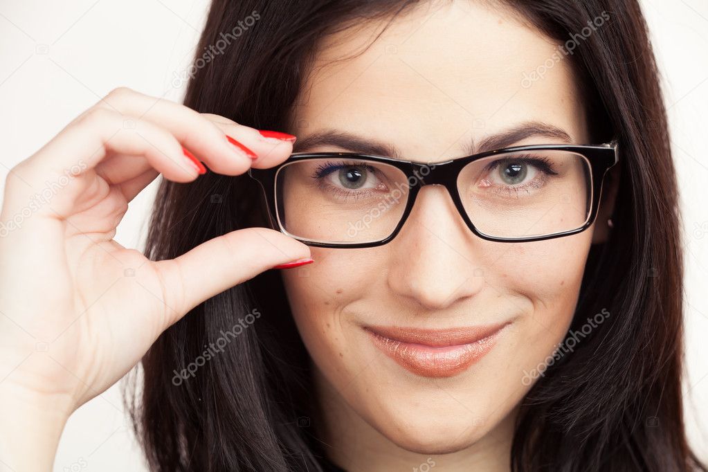 Eyewear glasses woman closeup portrait. Beautiful Brunette Girl