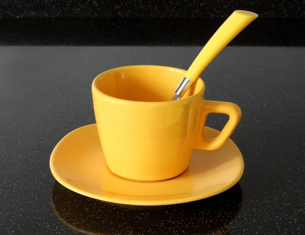 La tazza gialla Immagine Stock