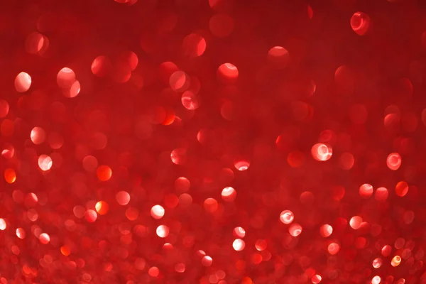 Εορταστική αφηρημένη θολή γκλίτερ φόντο κόκκινο χρώμα. — Φωτογραφία Αρχείου