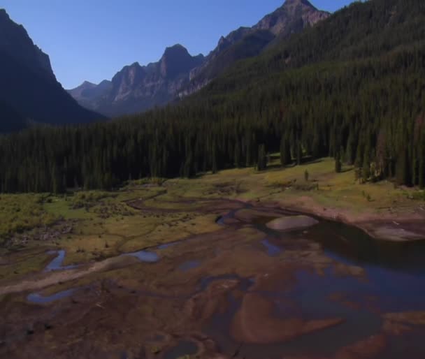 Aerial shot of mountain peaks and estuary — Stock Video