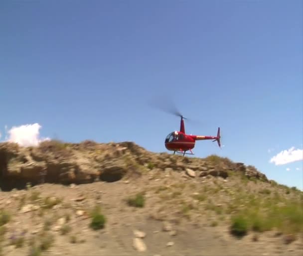 Driving next to a helicopter — Stock Video