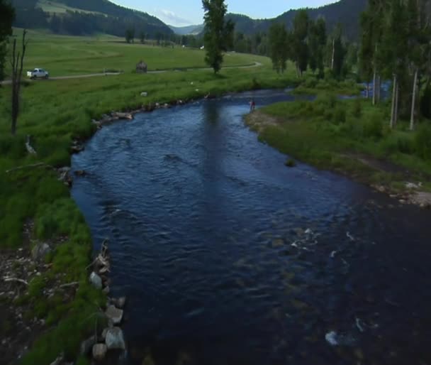 Aerial shot of two fly fisherman — Stock Video