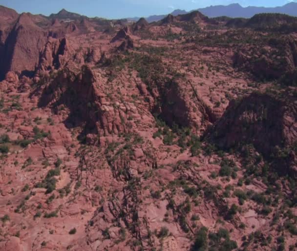 Aerial shot of red cliffs and mountains St. George Utah — Stock Video